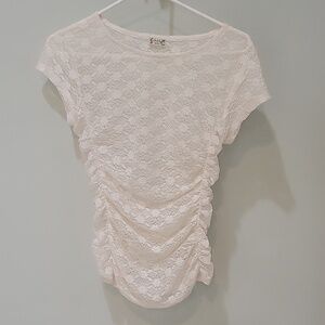FREE PEOPLE intimately off white lace top. Rutched sides, capped sleeves.  Small